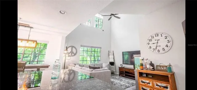 a living room with furniture and a window