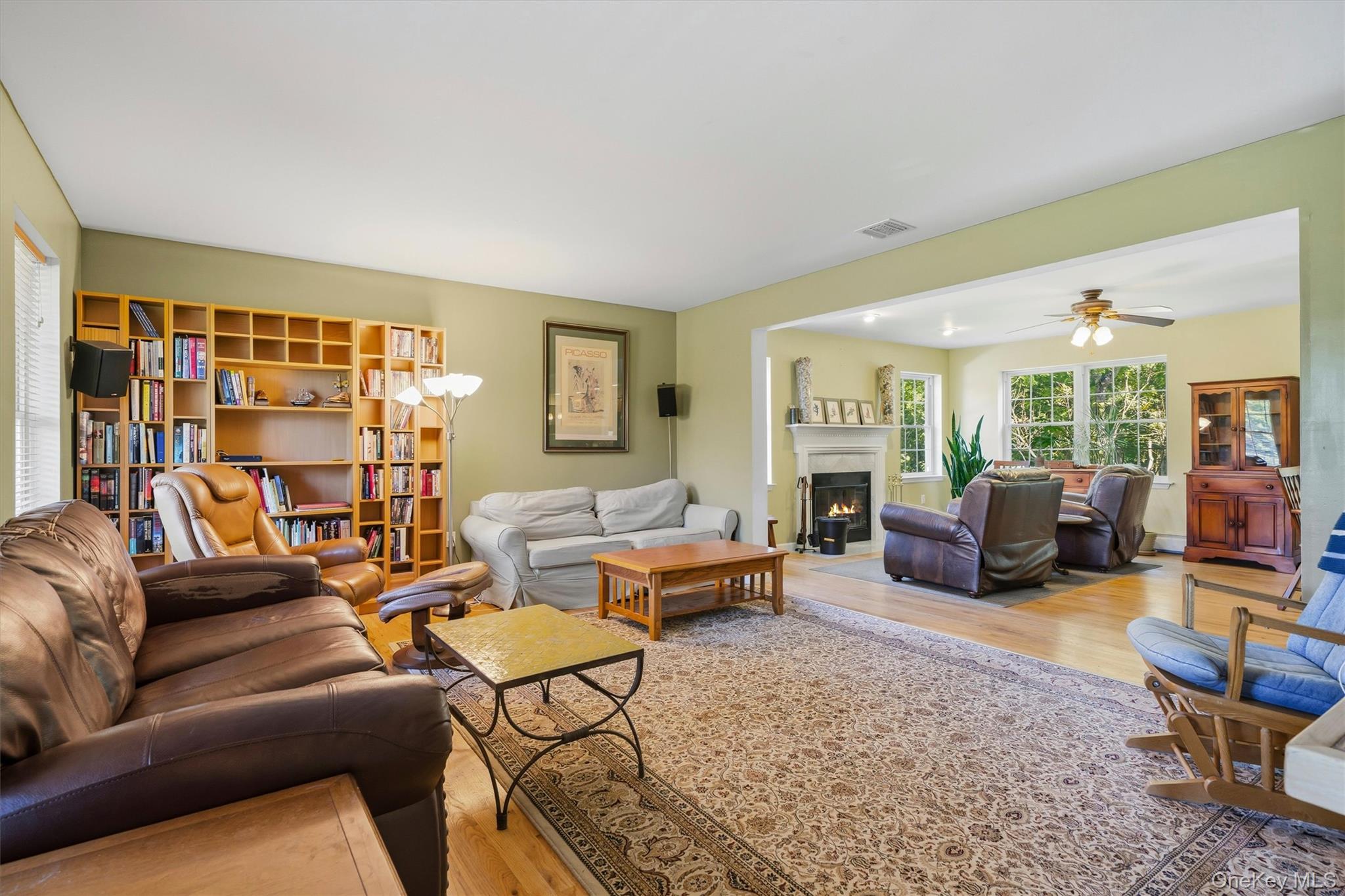 604 Ridgebury Road Slate Hill, NY 10973 - Photo 12 of 50 living room with view of the family room with fireplace.