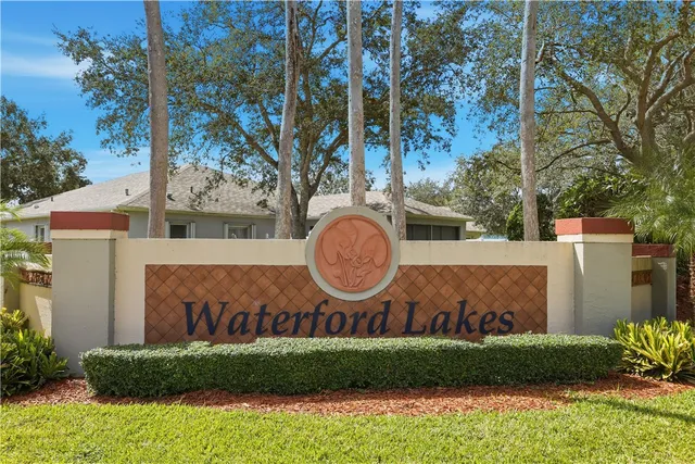 a wooden fence with some trees