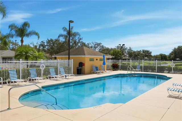 a view of a house with a swimming pool