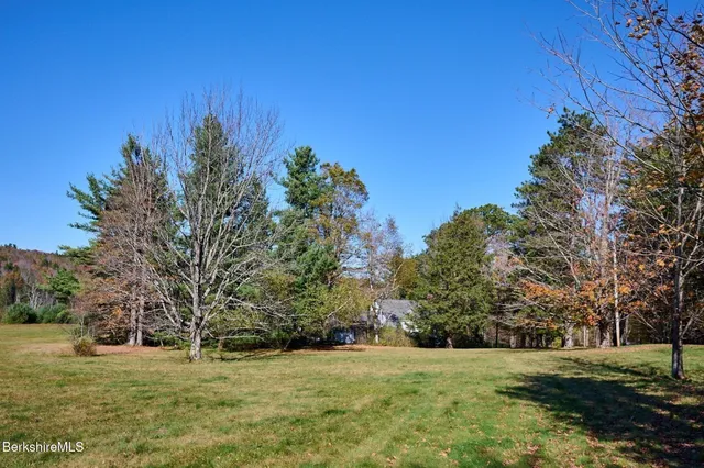 a view of a lake from a balcony