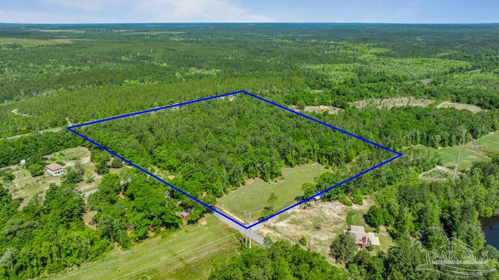 1400 Lake Heights Road Molino, FL 32577 - Photo 12 of 18 a view of a green field with clear sky