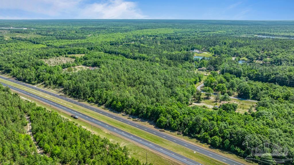 1400 Lake Heights Road Molino, FL 32577 - Photo 2 of 18 a view of a yard with a wooden fence