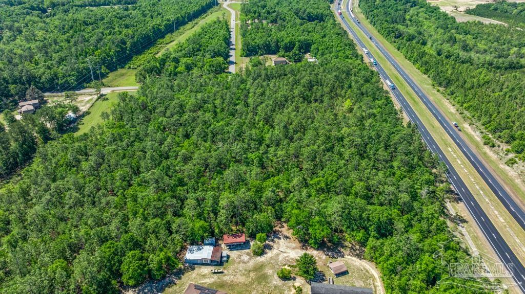 1400 Lake Heights Road Molino, FL 32577 - Photo 4 of 18 a backyard of a house with lots of green space