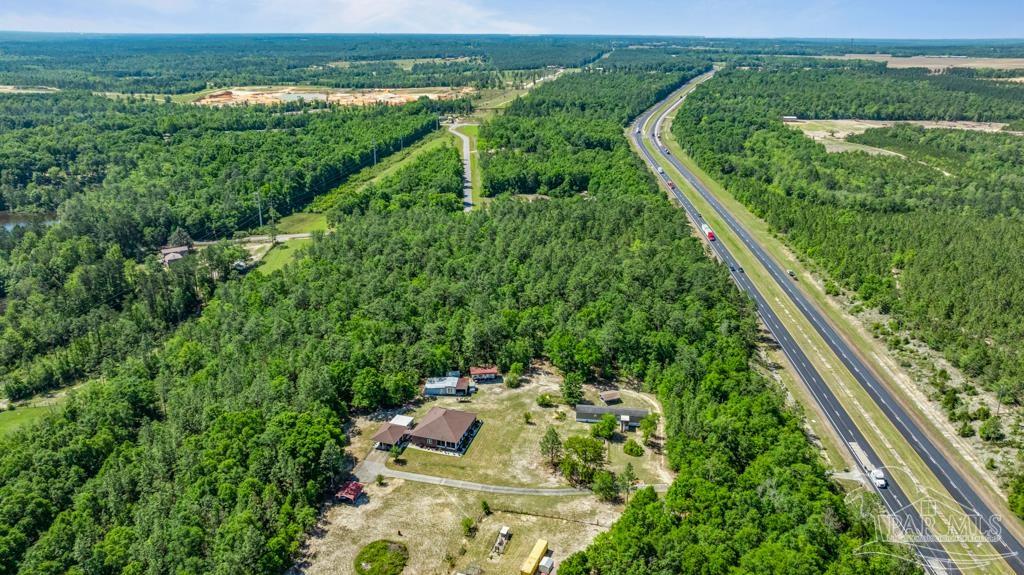 1400 Lake Heights Road Molino, FL 32577 - Photo 6 of 18 an aerial view of residential houses with outdoor space and trees