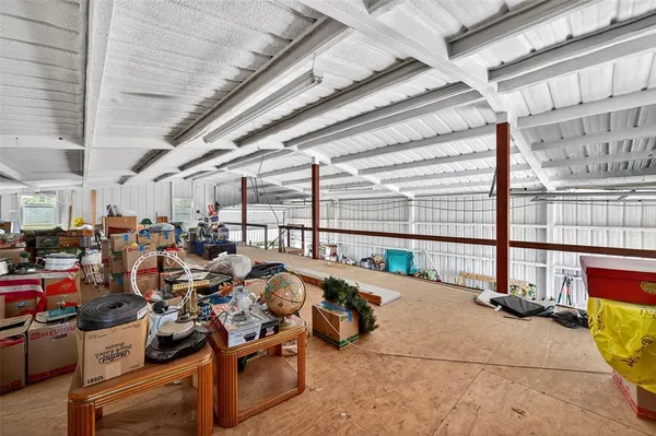 a view of a garage with many windows