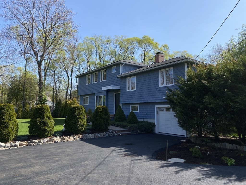 490 Concord Road Sudbury, MA 01776 - Photo 2 of 31 a view of a house with a yard and tree s