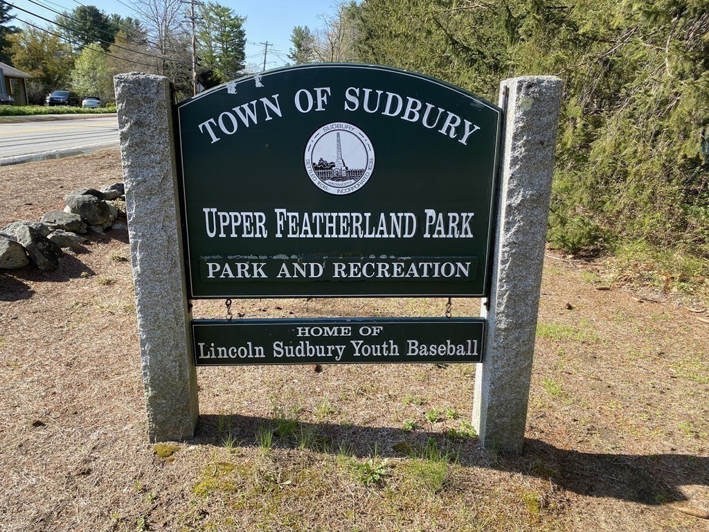 490 Concord Road Sudbury, MA 01776 - Photo 31 of 31 a sign broad on the side of the road