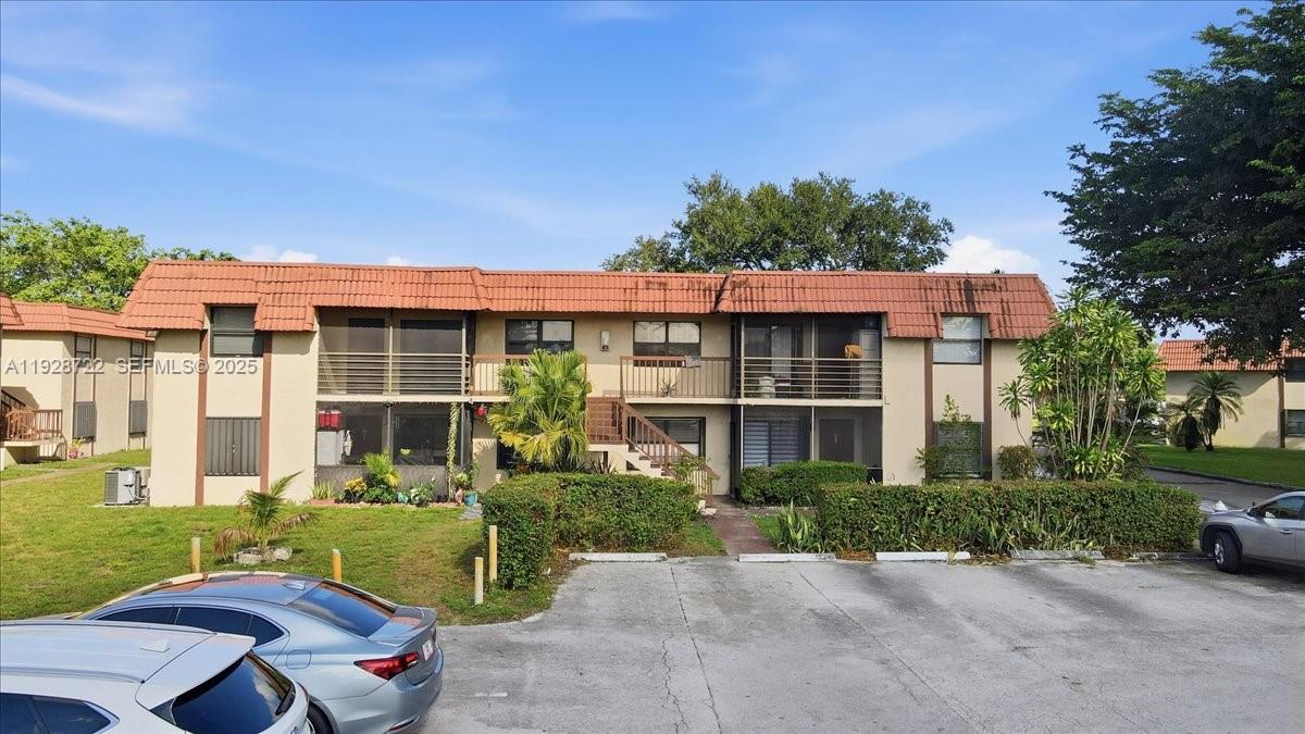 Hialeah Hialeah, FL 33016 - Photo 3 of 32 a front view of a house with garden