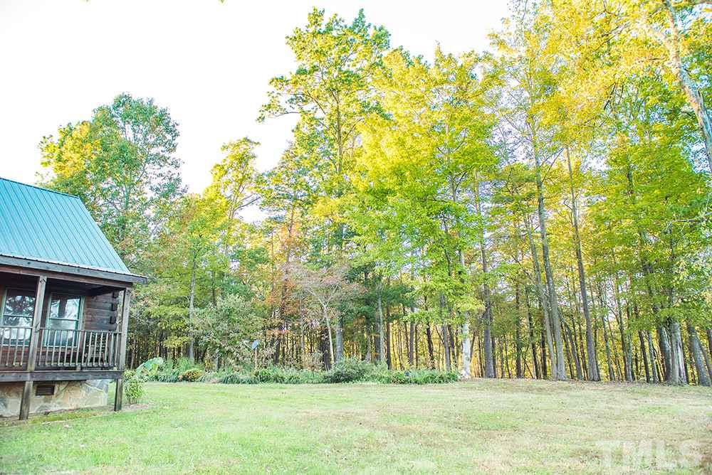 3520 Bowmantown Road Roxboro, NC 27574 - Photo 11 of 24 a front view of a house with a yard