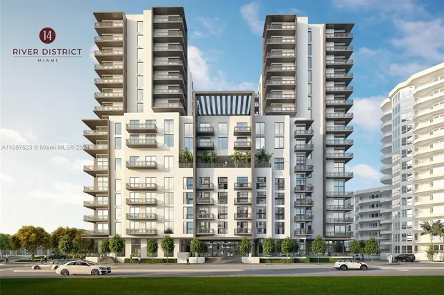 front view of a building with a yard