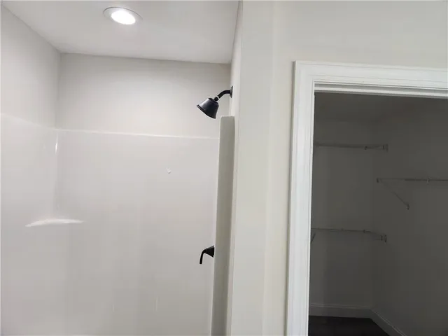 a close view of a shower in a bathroom