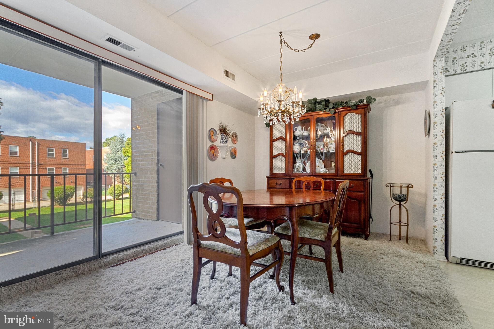 8922 Krewstown Road, Unit 203 Philadelphia, PA 19115 - Photo 2 of 14 Dining Room with sliders