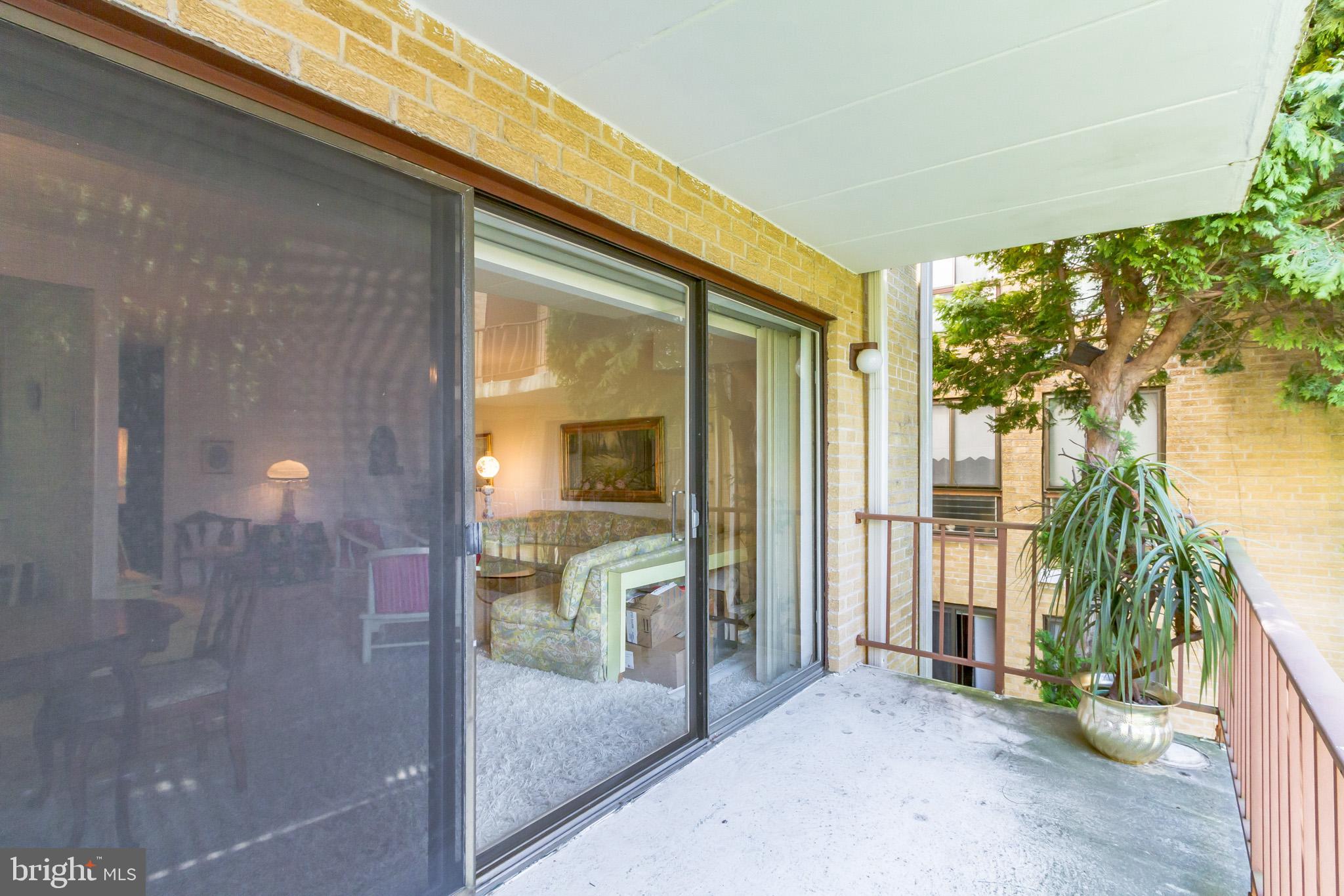 8922 Krewstown Road, Unit 203 Philadelphia, PA 19115 - Photo 12 of 14 Large balcony overlooks the courtyard