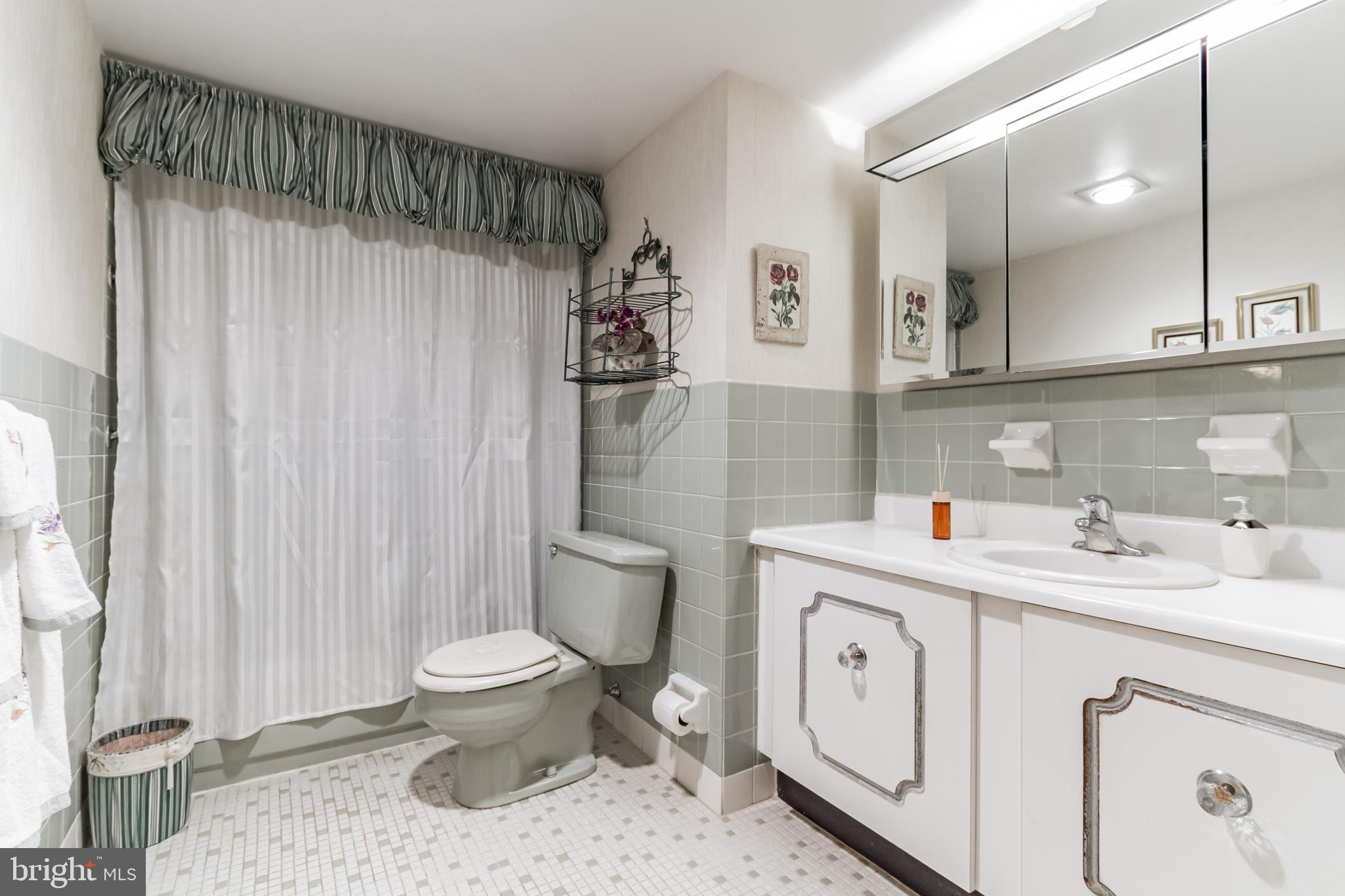 8922 Krewstown Road, Unit 203 Philadelphia, PA 19115 - Photo 7 of 14 Bathroom with large vanity