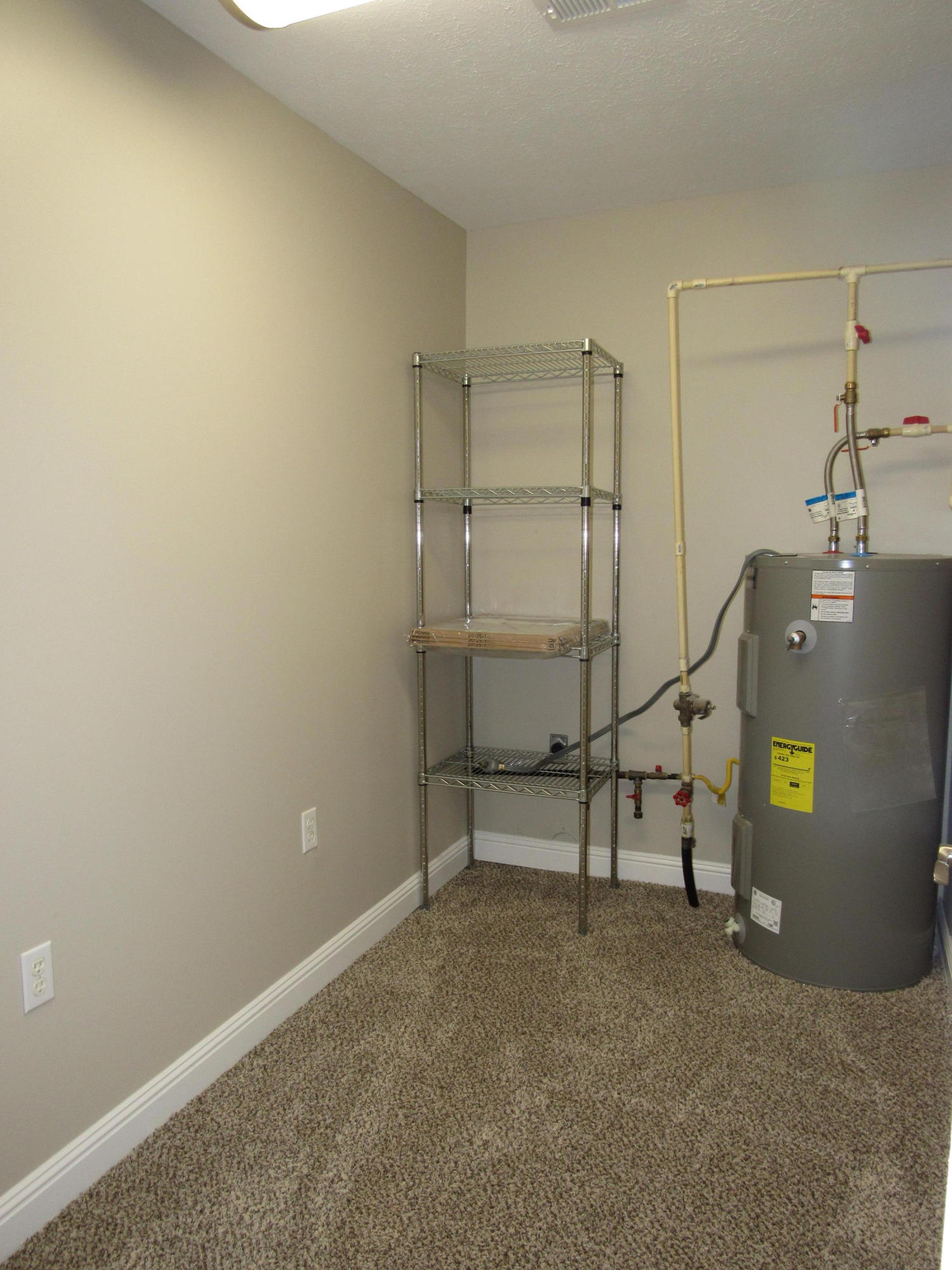5218 Banner-Roslin Road Jamestown, TN 38556 - Photo 23 of 40 Pantry/ New Electric Water Heater