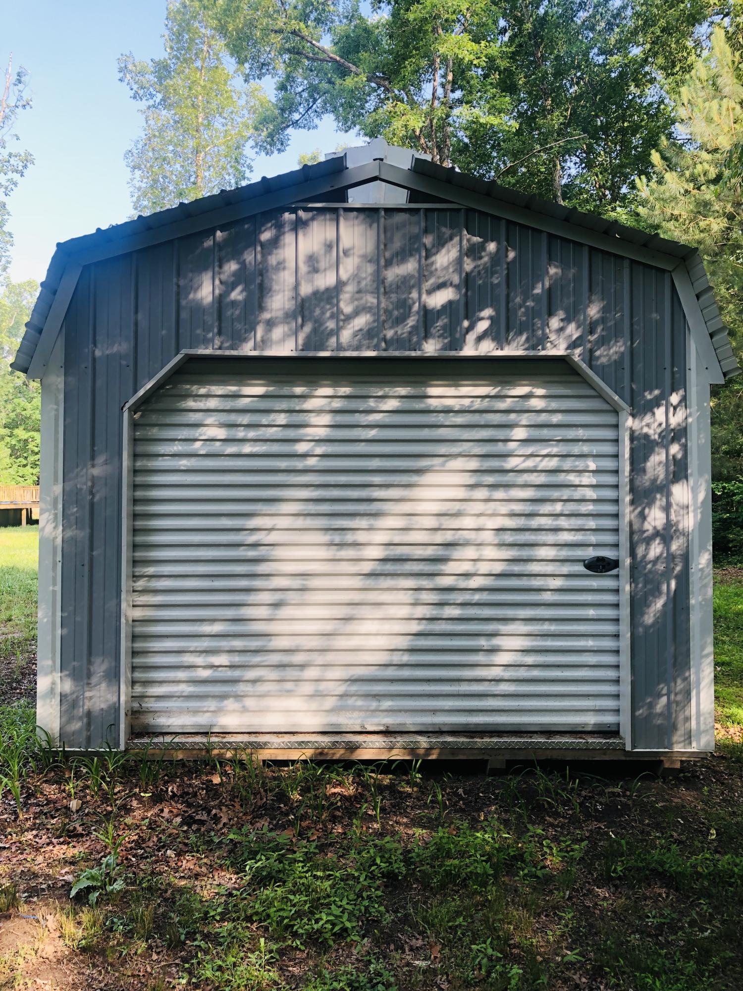5218 Banner-Roslin Road Jamestown, TN 38556 - Photo 39 of 40 Side View/StorageShed with Rolling Door