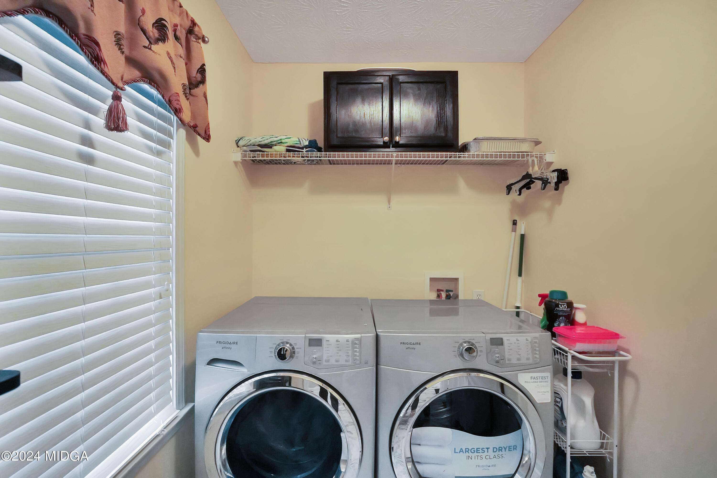 208 Brown Branch Road Locust Grove, GA 30248 - Photo 30 of 44 a utility room with dryer and washer