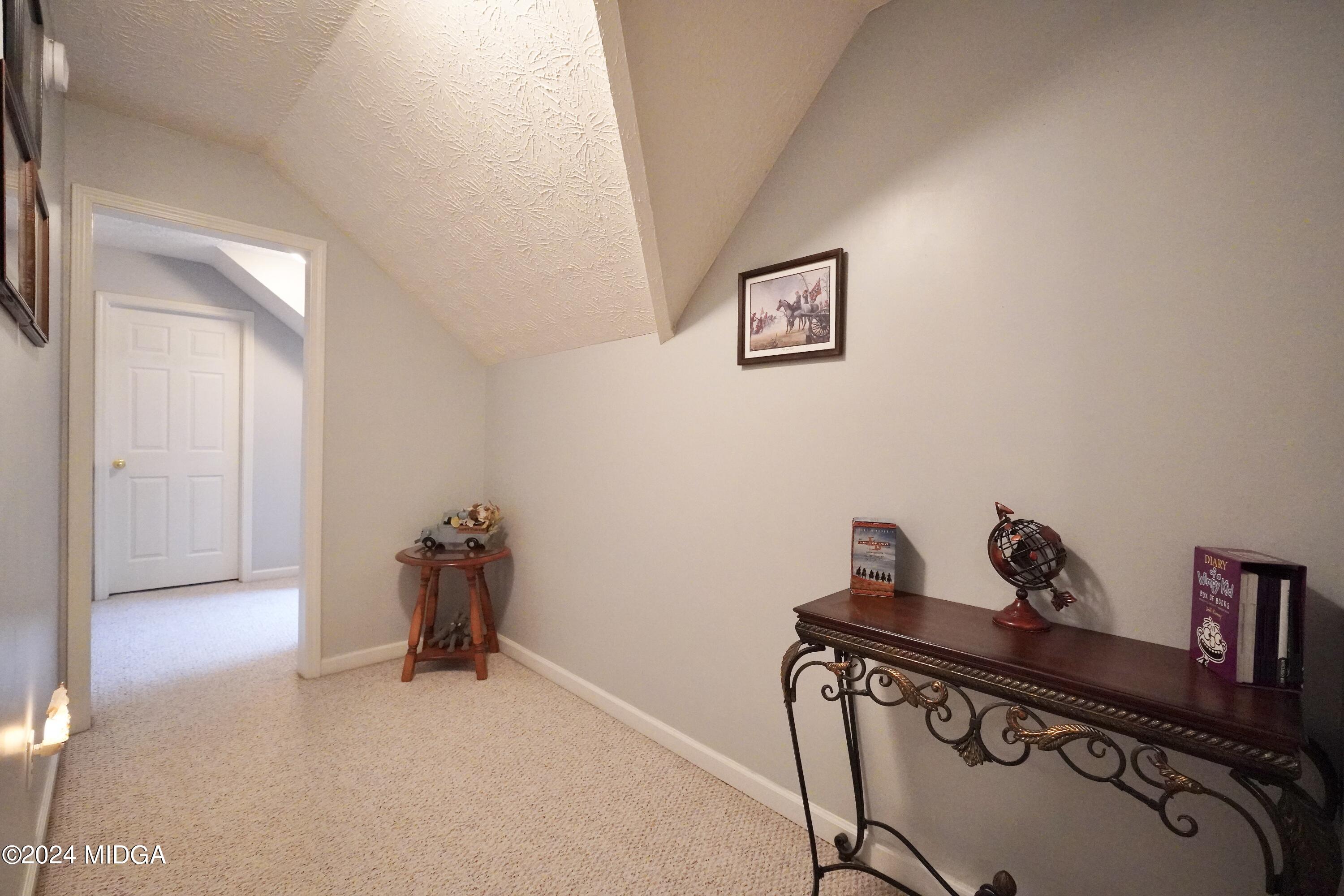 208 Brown Branch Road Locust Grove, GA 30248 - Photo 36 of 44 a view of a hallway with workspace and a window
