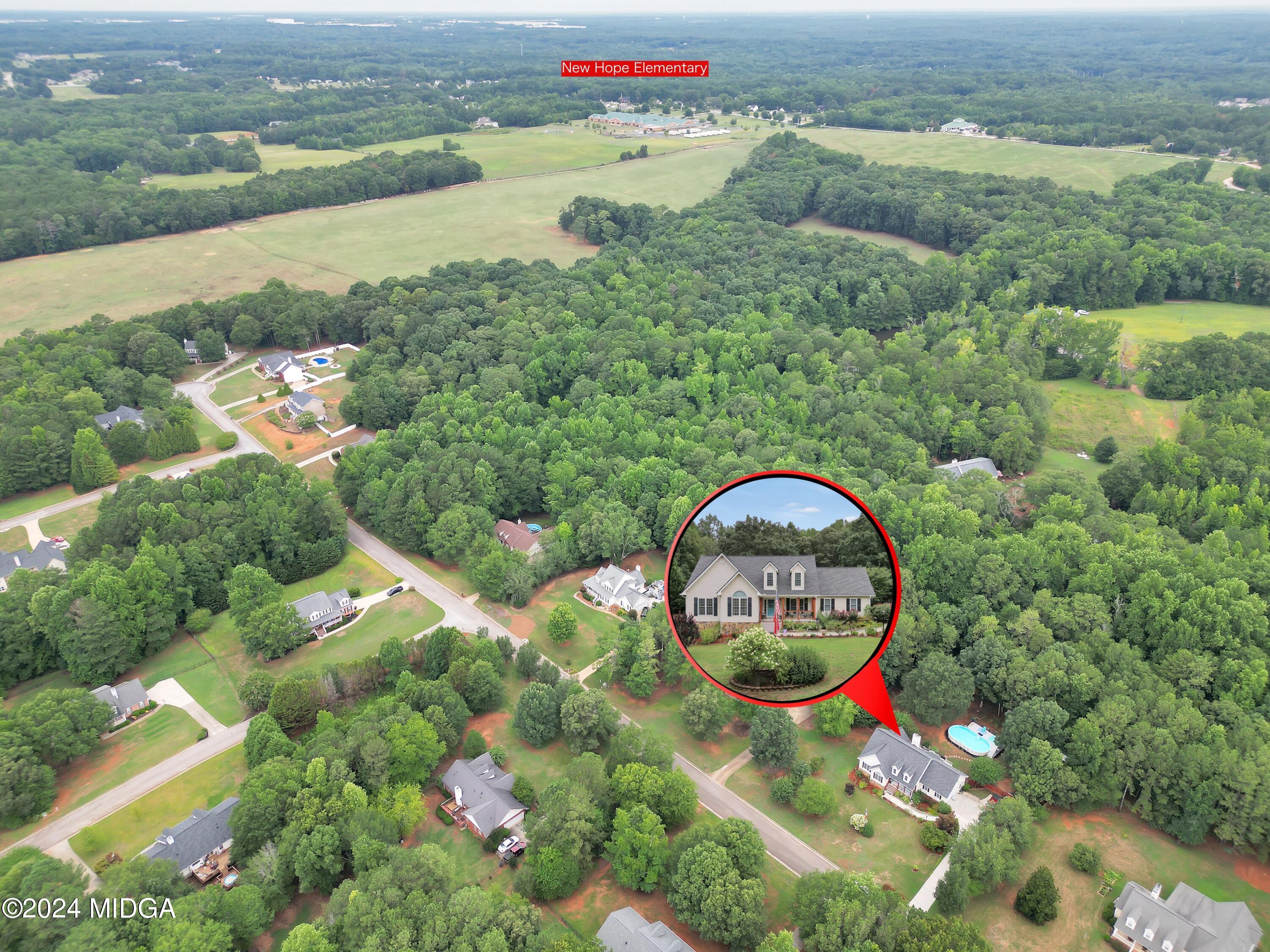 208 Brown Branch Road Locust Grove, GA 30248 - Photo 43 of 44 an aerial view of a houses with a lake view