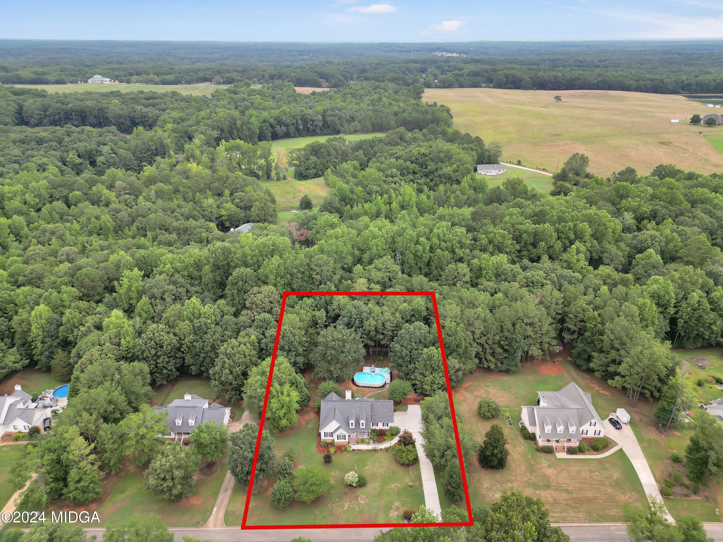 208 Brown Branch Road Locust Grove, GA 30248 - Photo 44 of 44 an aerial view of residential houses with outdoor space and lakeside