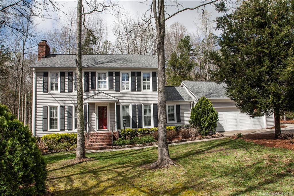 2751 Farmstead Lane, Unit 63 Fort Mill, SC 29708 - Photo 1 of 30 a front view of a house with a yard
