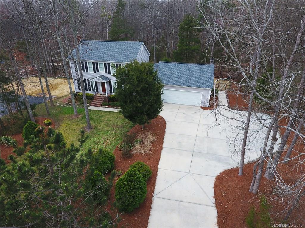 2751 Farmstead Lane, Unit 63 Fort Mill, SC 29708 - Photo 3 of 30 a view of a house with a yard