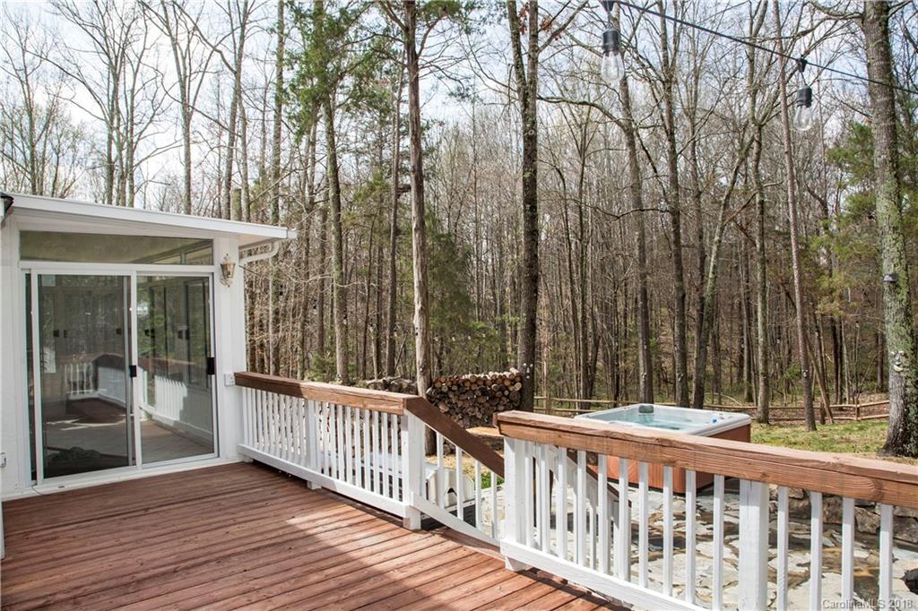 2751 Farmstead Lane, Unit 63 Fort Mill, SC 29708 - Photo 22 of 30 a view of a wooden deck and backyard