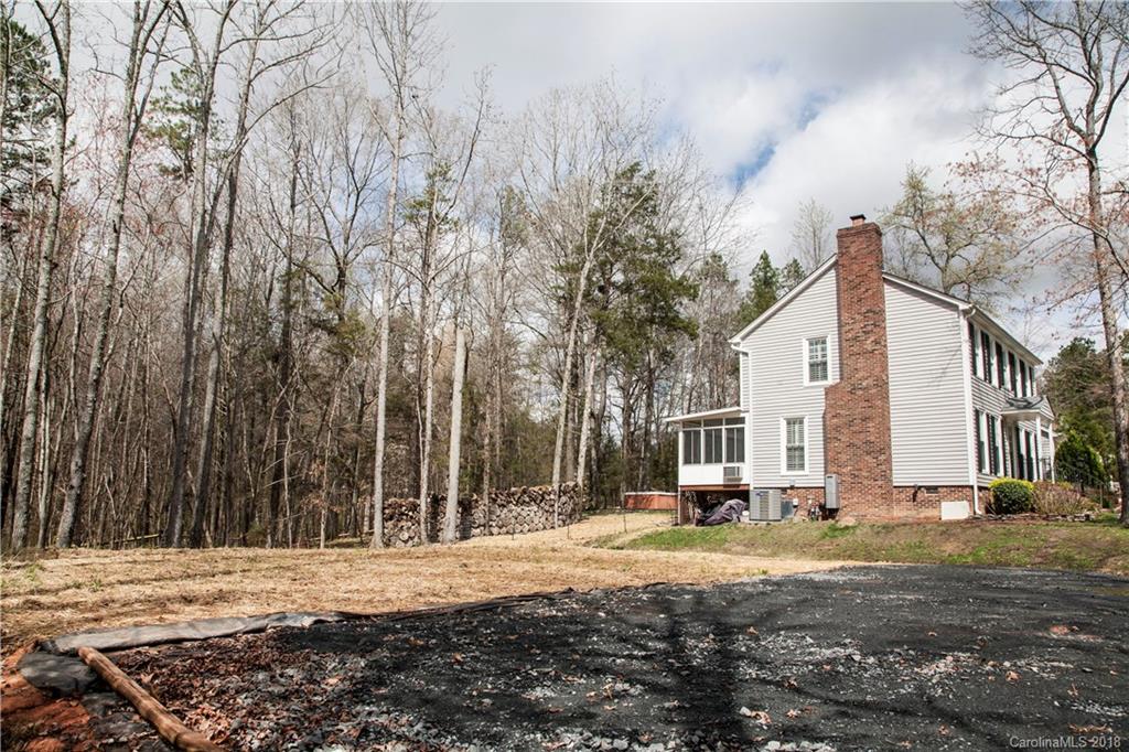 2751 Farmstead Lane, Unit 63 Fort Mill, SC 29708 - Photo 29 of 30 a view of a house with a yard