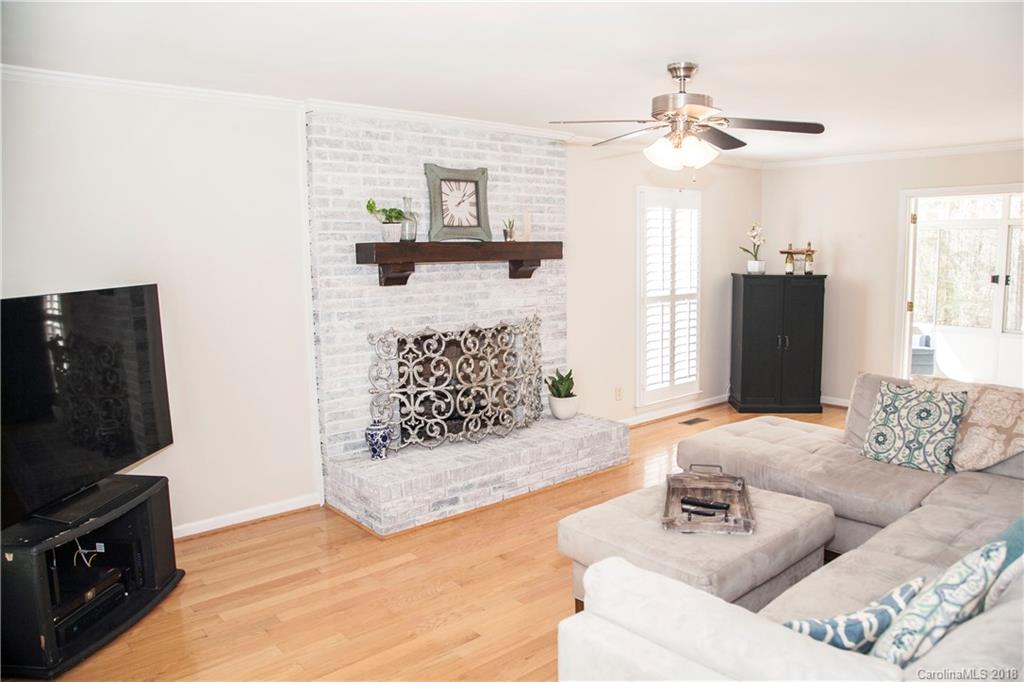 2751 Farmstead Lane, Unit 63 Fort Mill, SC 29708 - Photo 4 of 30 a living room with furniture and a flat screen tv