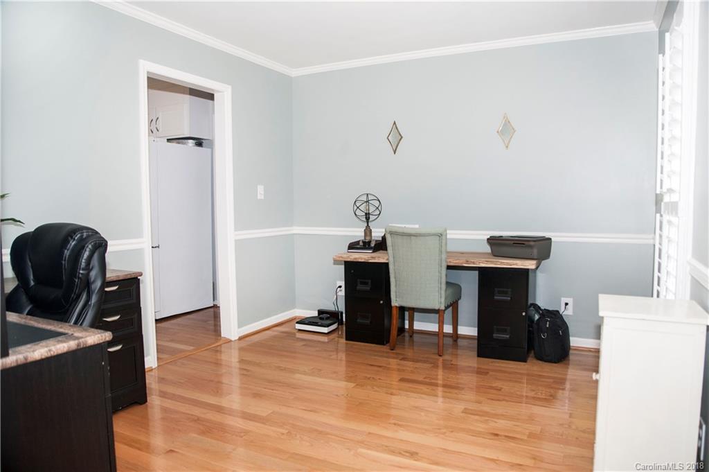 2751 Farmstead Lane, Unit 63 Fort Mill, SC 29708 - Photo 8 of 30 a view of a workspace with furniture and wooden floor