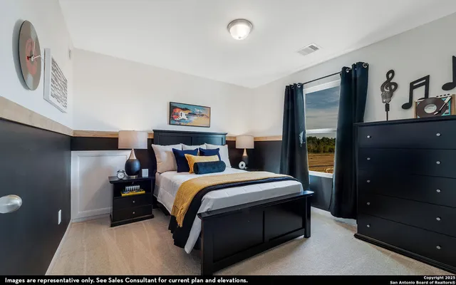 a bedroom with a bed and a dresser