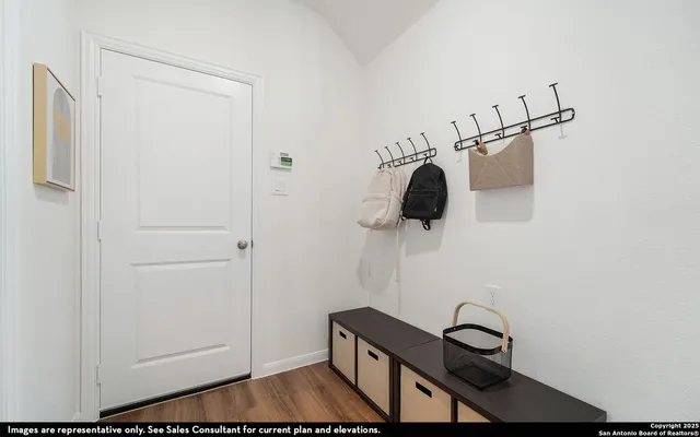 a view of a room with rack on the wall