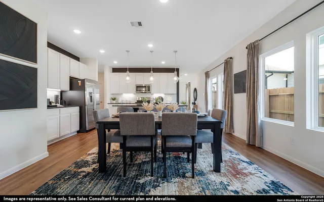 a view of a dining room with furniture