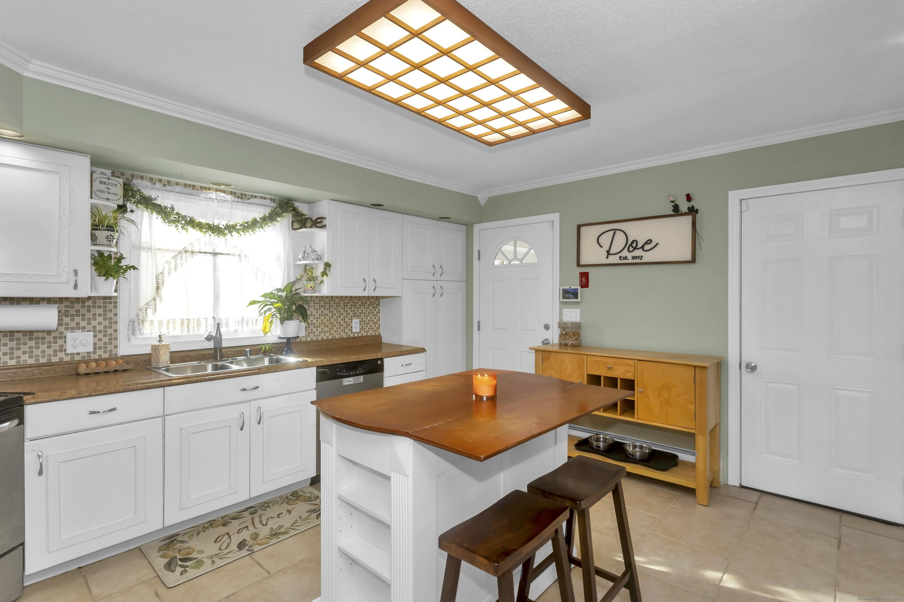 21 Brentwood Street Springfield, MA 01108 - Photo 11 of 40 a kitchen with stainless steel appliances granite countertop a stove a sink dishwasher and a refrigerator
