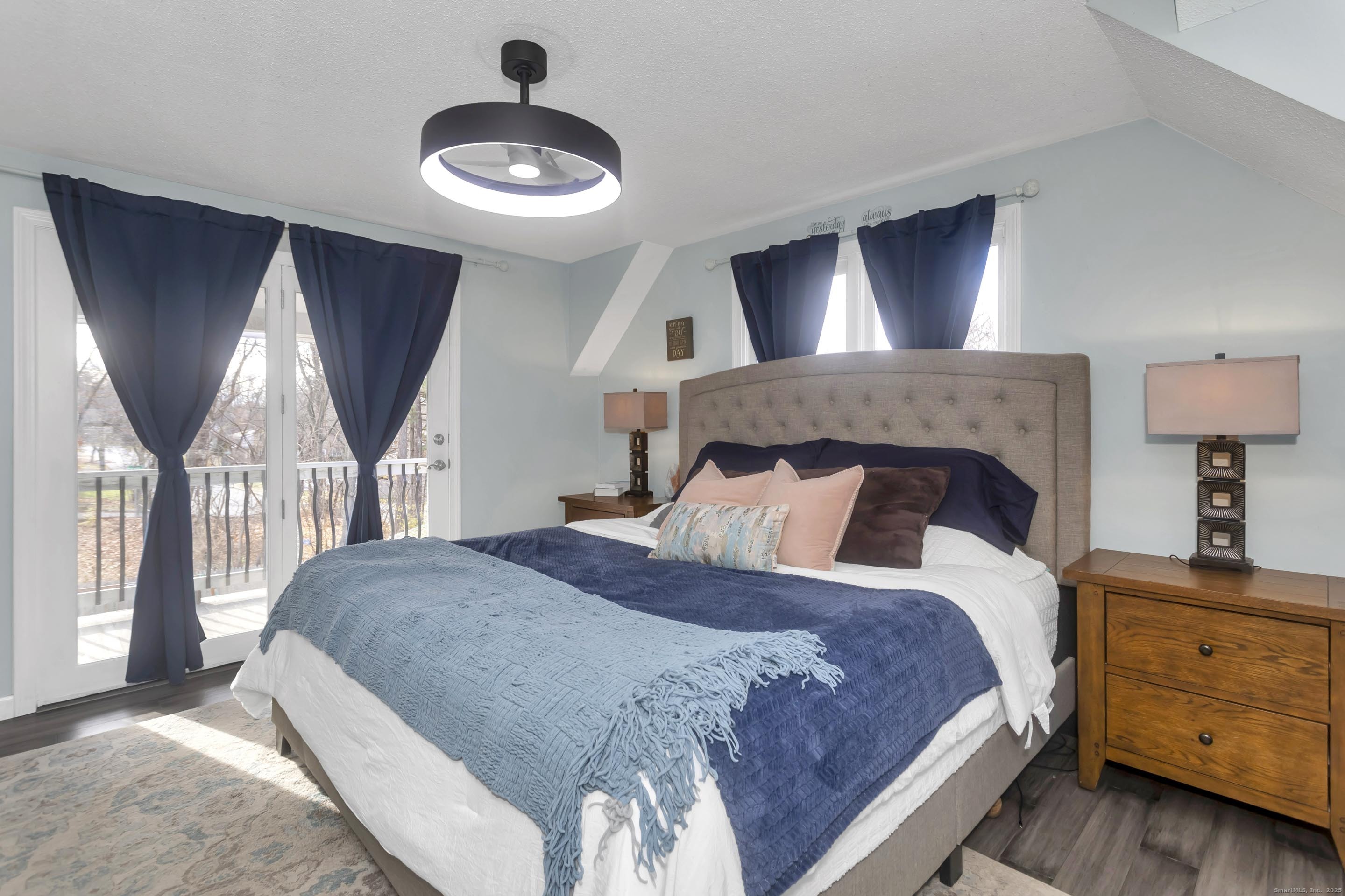 21 Brentwood Street Springfield, MA 01108 - Photo 20 of 40 a bedroom with a large bed and a window