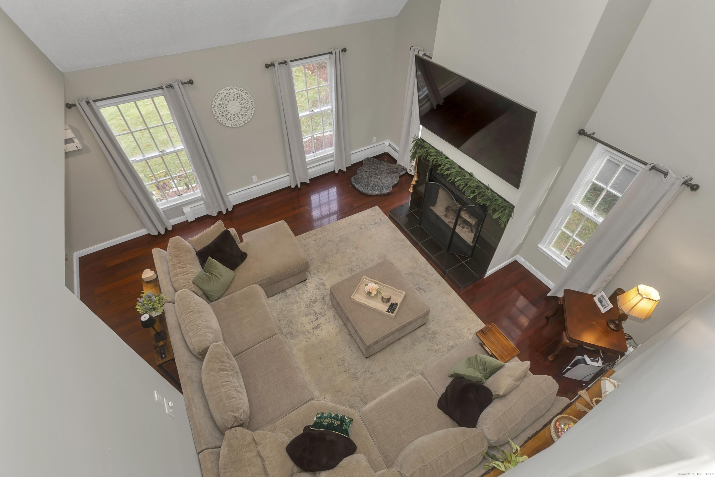21 Brentwood Street Springfield, MA 01108 - Photo 24 of 40 a living room with furniture and a flat screen tv