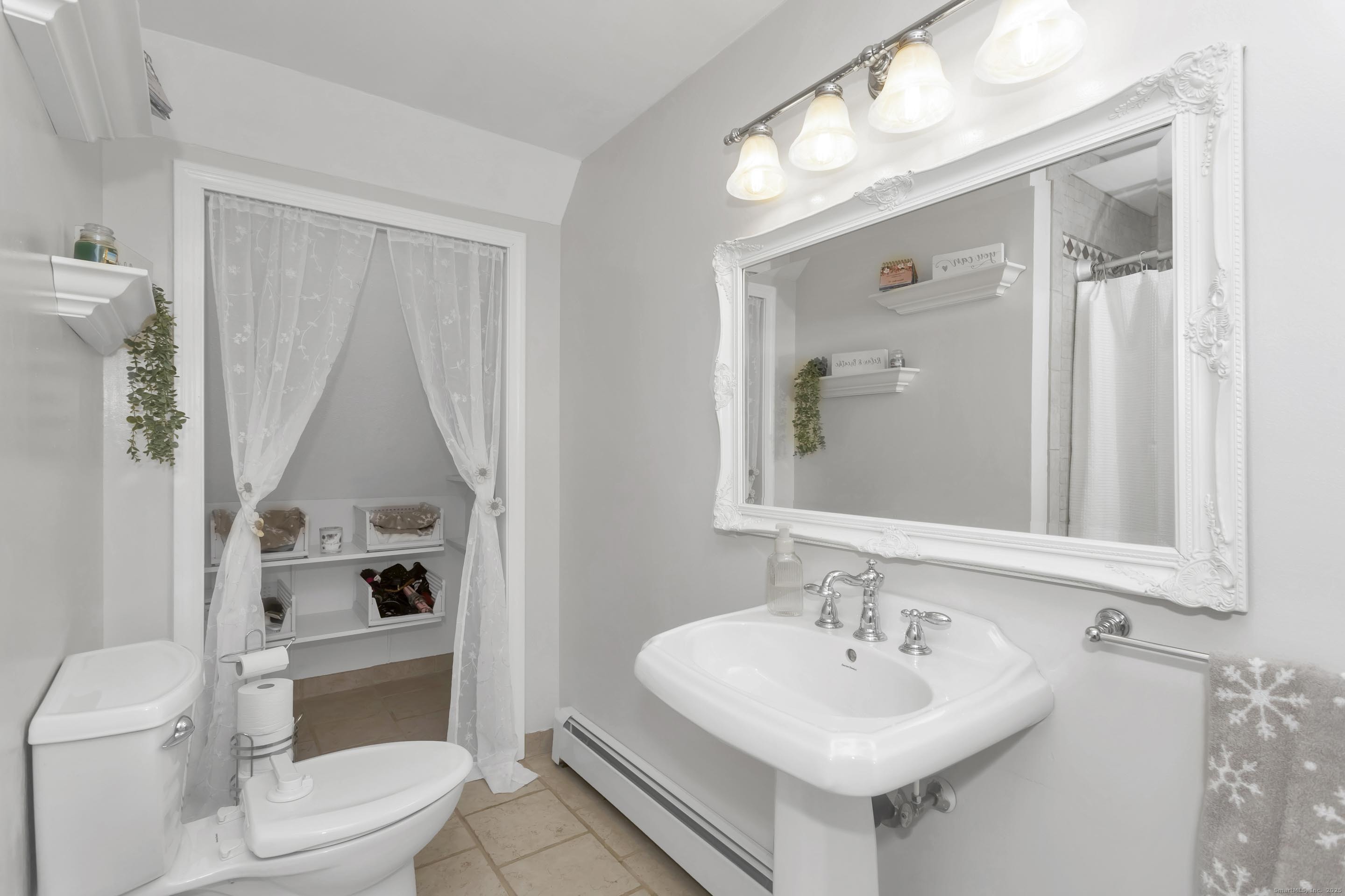 21 Brentwood Street Springfield, MA 01108 - Photo 27 of 40 a bathroom with a sink toilet and shower