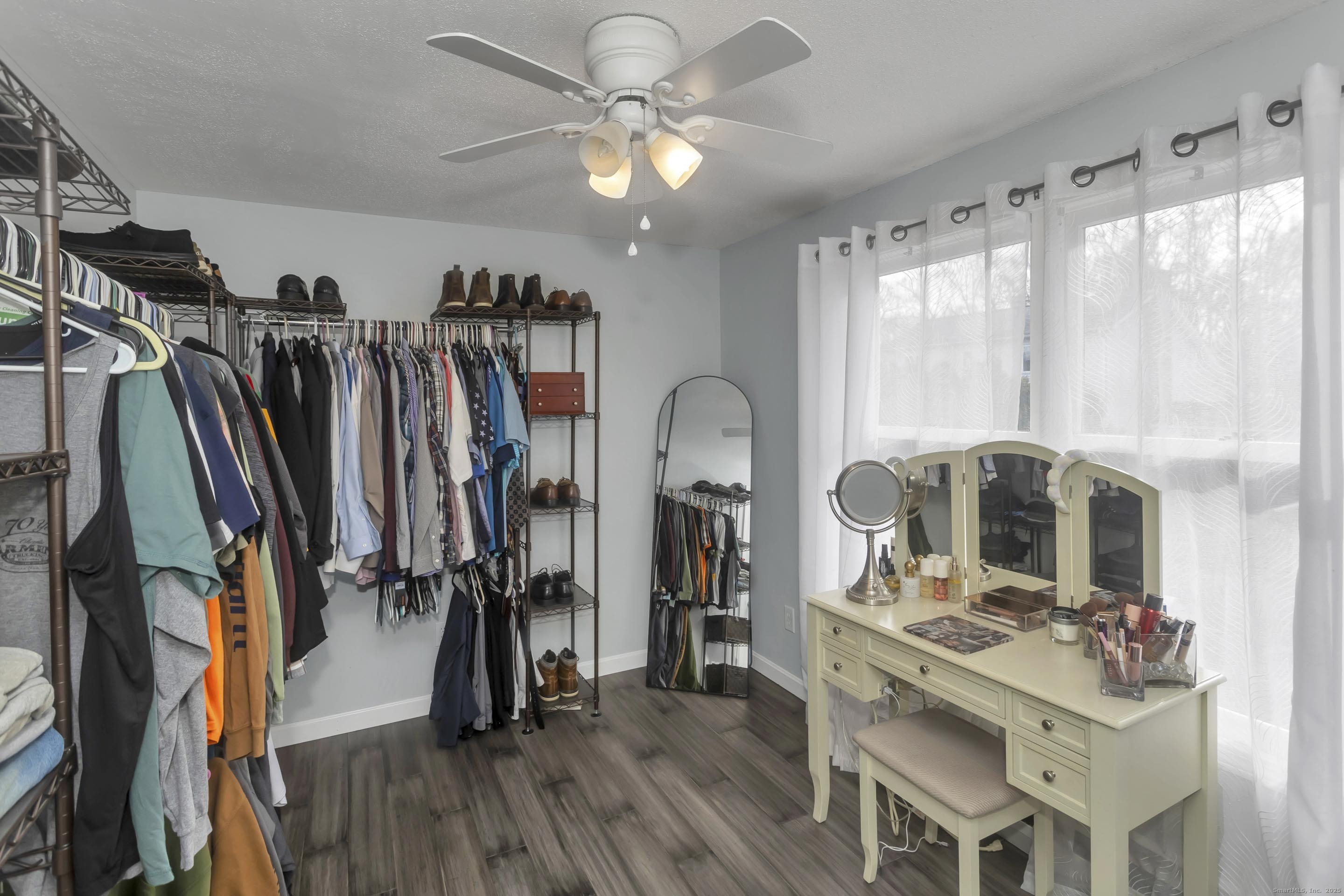 21 Brentwood Street Springfield, MA 01108 - Photo 28 of 40 a view of a room with lots of stuff and hardwood floor