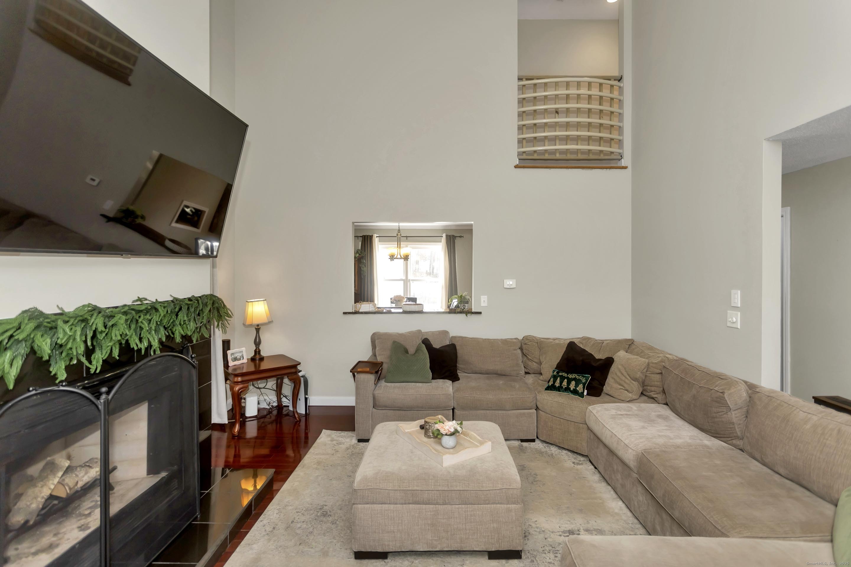 21 Brentwood Street Springfield, MA 01108 - Photo 3 of 40 a living room with furniture and a flat screen tv