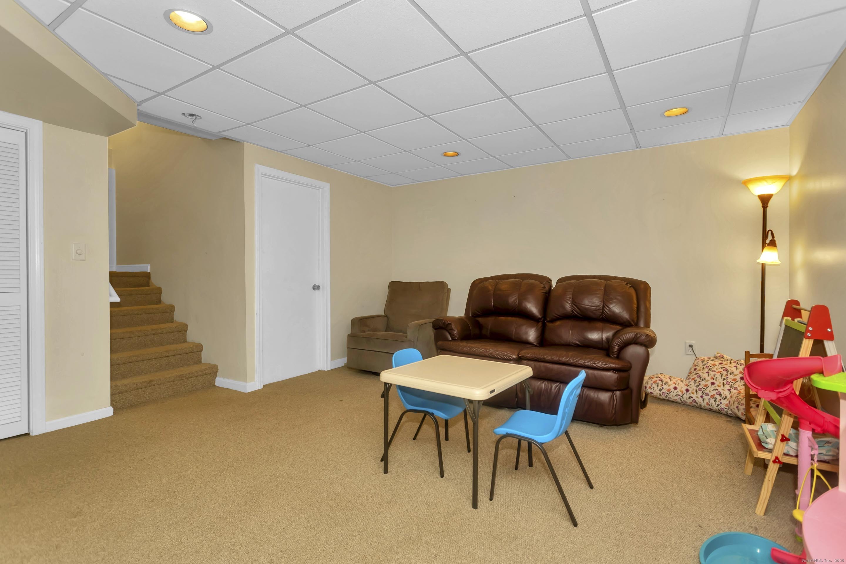 21 Brentwood Street Springfield, MA 01108 - Photo 31 of 40 a living room with furniture and a wooden floor