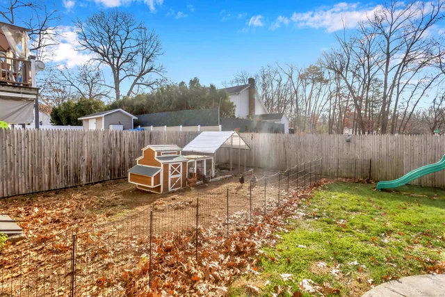a backyard of a house with lots of green space