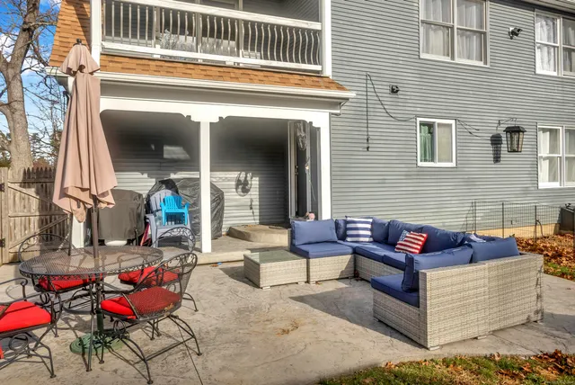 a building outdoor space with patio furniture