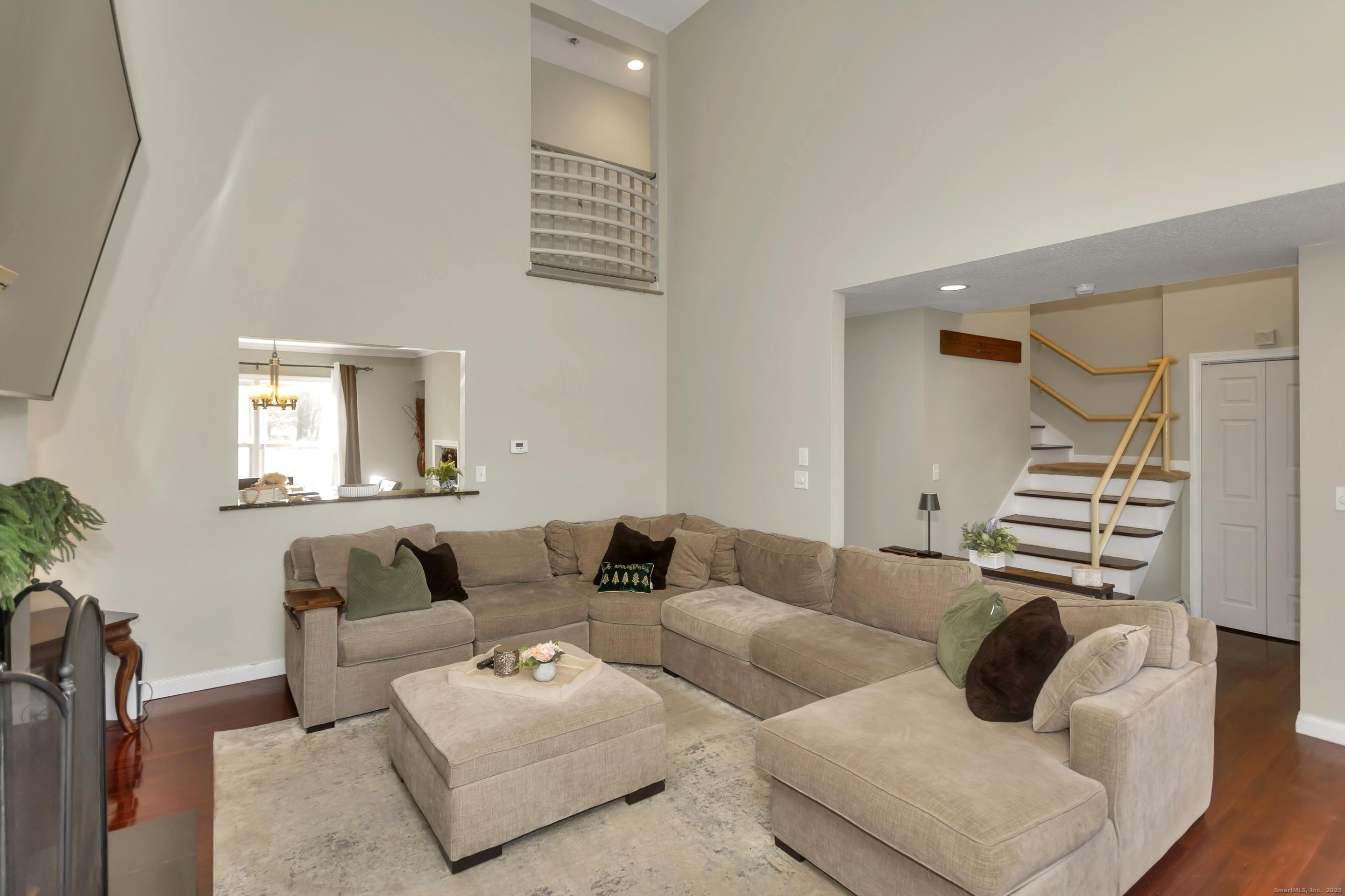 21 Brentwood Street Springfield, MA 01108 - Photo 4 of 40 a living room with furniture and a wooden floor