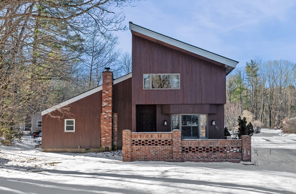 88 Squannacook Road Shirley, MA 01464 - Photo 1 of 39 a view of a house with a yard