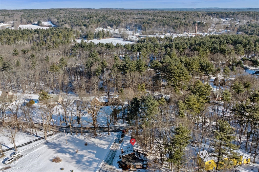 88 Squannacook Road Shirley, MA 01464 - Photo 13 of 39 an aerial view of house with yard and mountain view in city