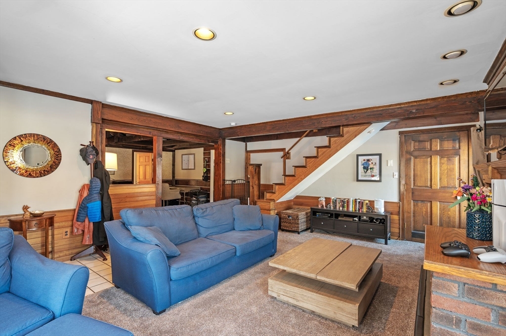 88 Squannacook Road Shirley, MA 01464 - Photo 22 of 39 a living room with furniture and a large window
