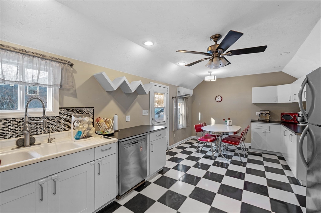 88 Squannacook Road Shirley, MA 01464 - Photo 24 of 39 a hallway with a sink and a window