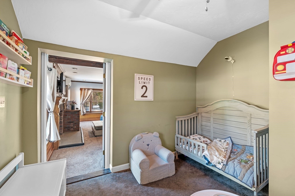 88 Squannacook Road Shirley, MA 01464 - Photo 34 of 39 a bedroom with furniture and a window