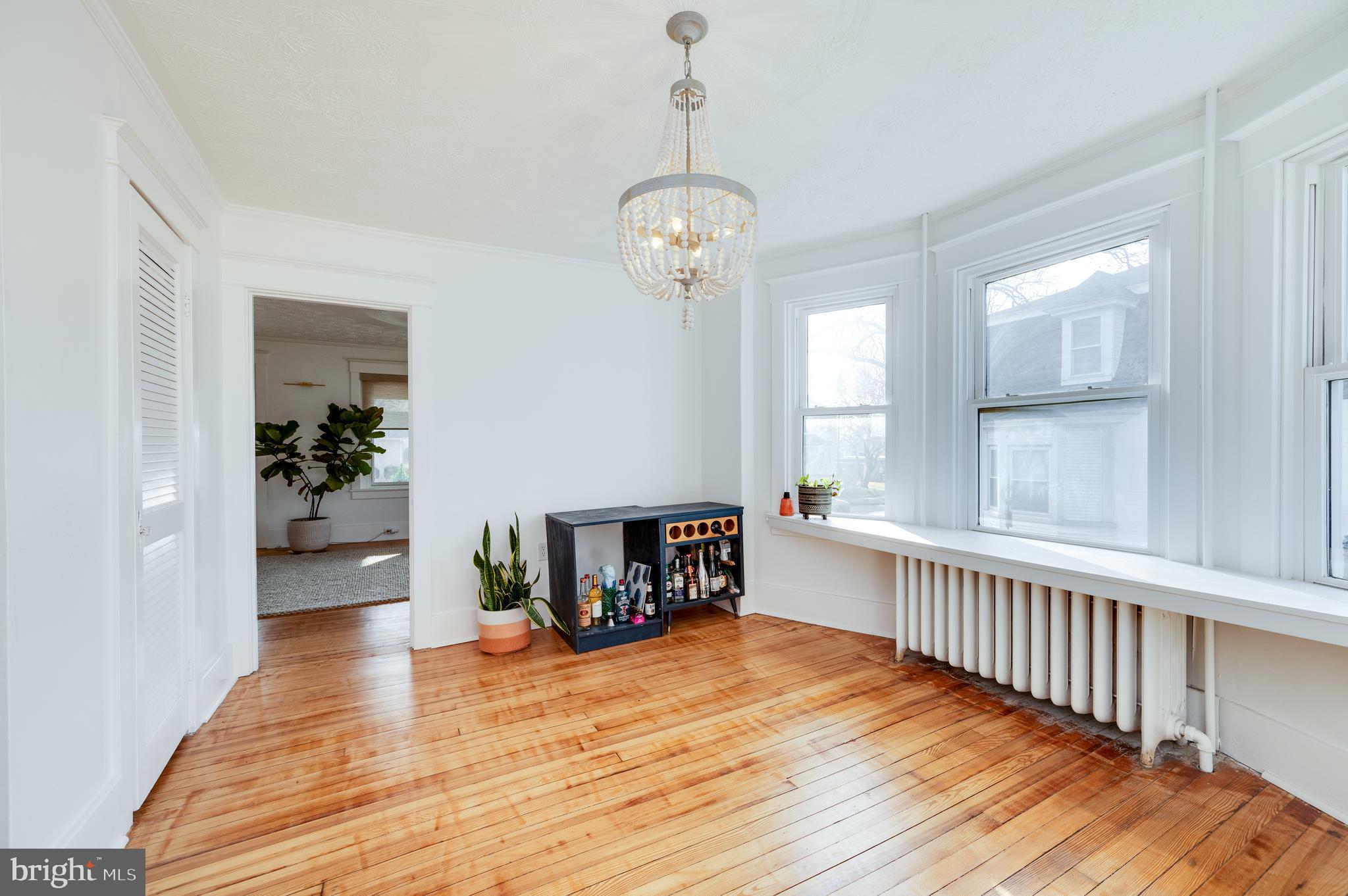 2021 Noble Street Reading, PA 19609 - Photo 15 of 54 a view of a room with wooden floor and furniture